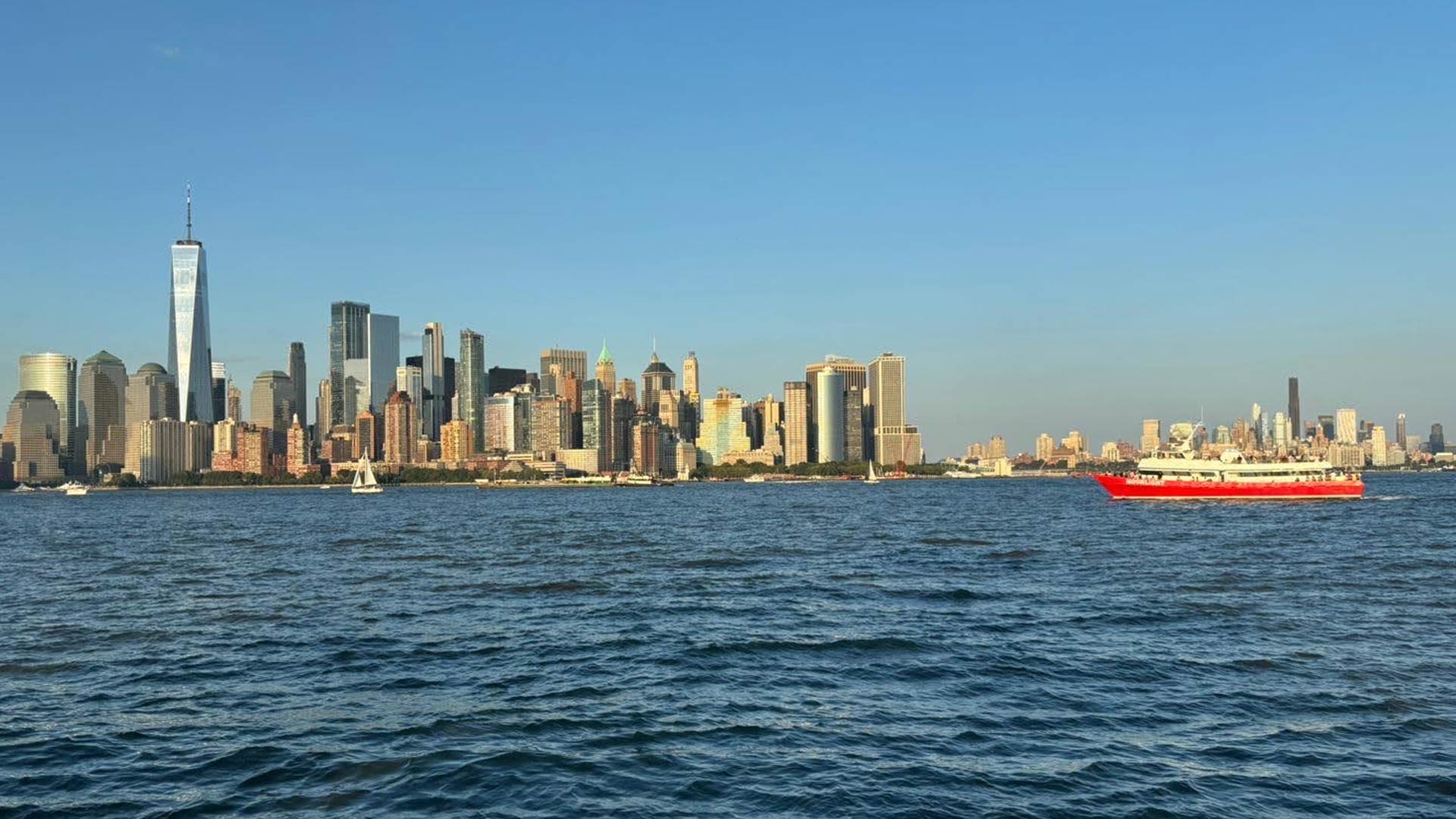 NYC boat cruise with New York Harbor and Manhattan skyline views.